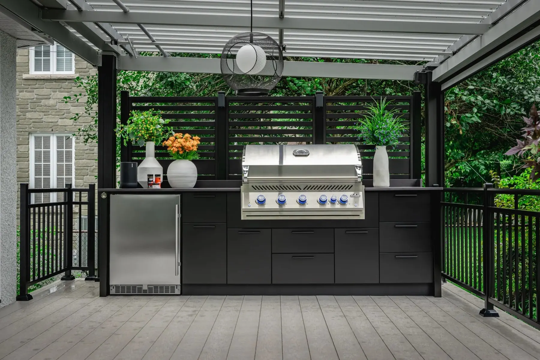 The covered terrace — appliance and hardware detail